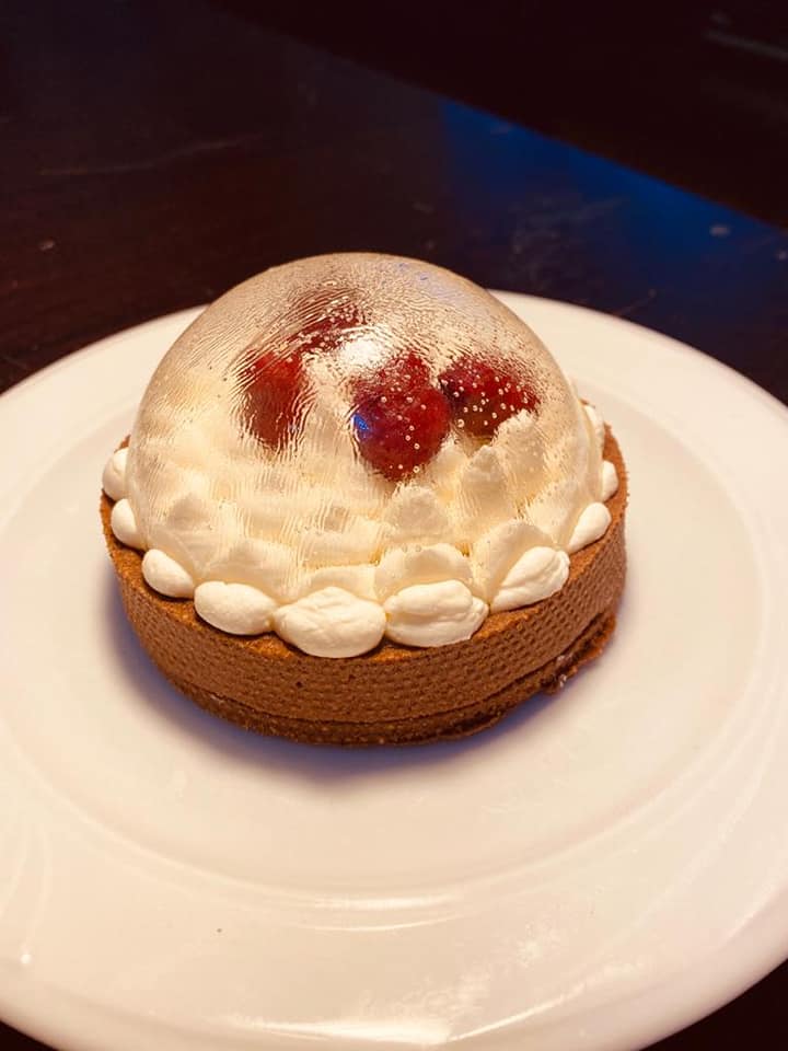 Strawberry cream dome on a shortcrust tart